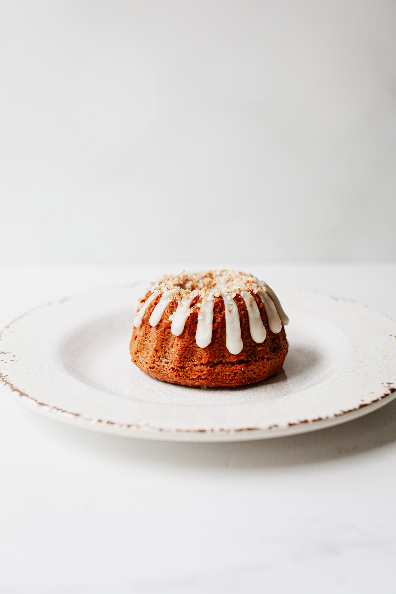 Cake: Sweet Potato Mini Bundt with Vanilla Glaze &amp; Toasted Coconut